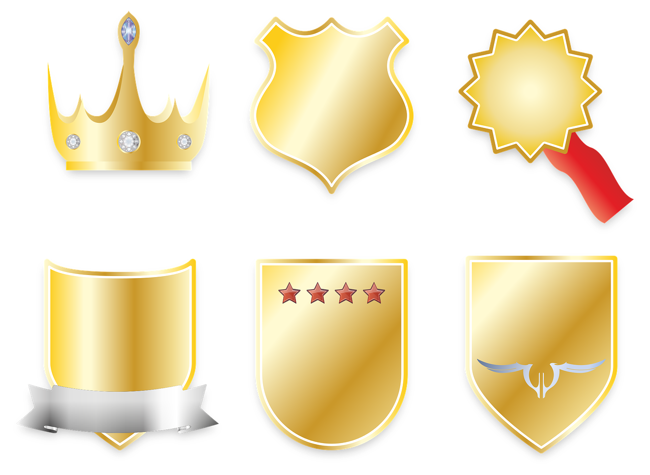 Grafika przedstawiająca złote zarysy różnego rodzaju herbów na białym tle